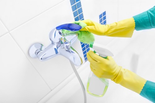 Kennington office cleaners sanitising desks and high-touch surfaces